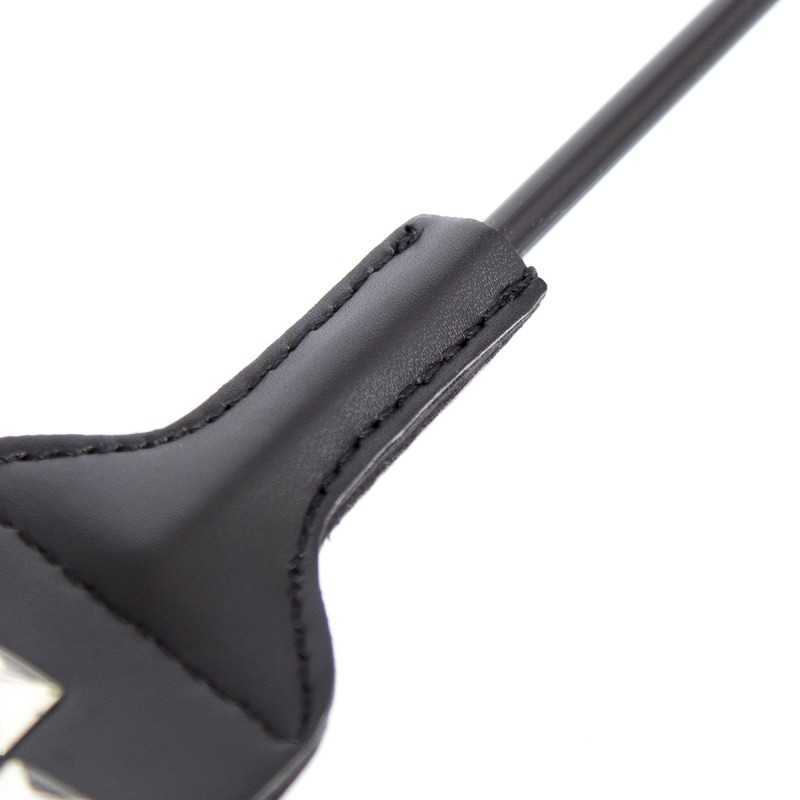 Paddle Plumeau XO : Douceur et intensité en un accessoire