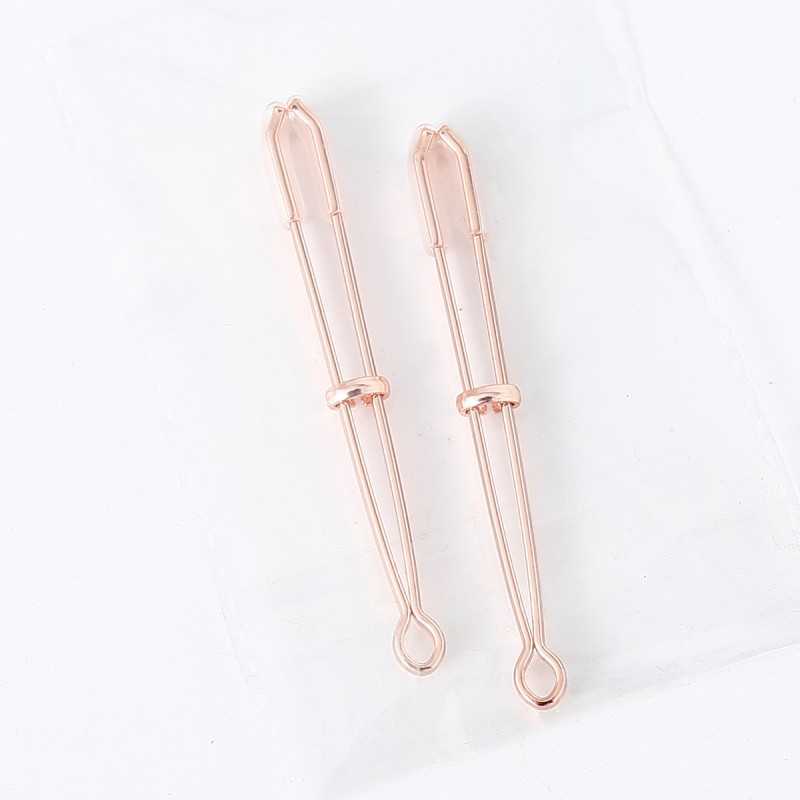 Pinces à seins or rose - Élégance et confort personnalisés